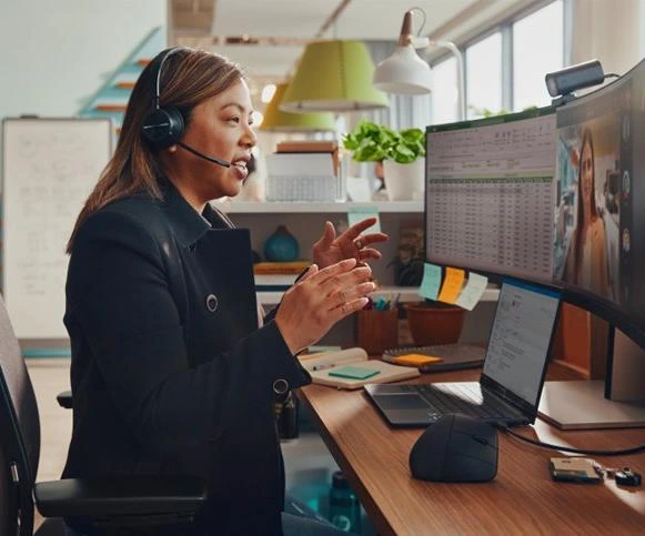 Professional working at an HP desktop setup